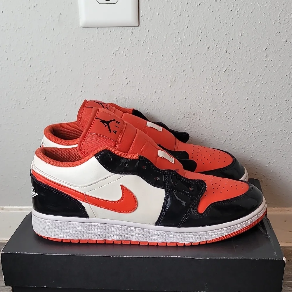 Air Jordan 1 Low Kids Black and Orange Sneakers